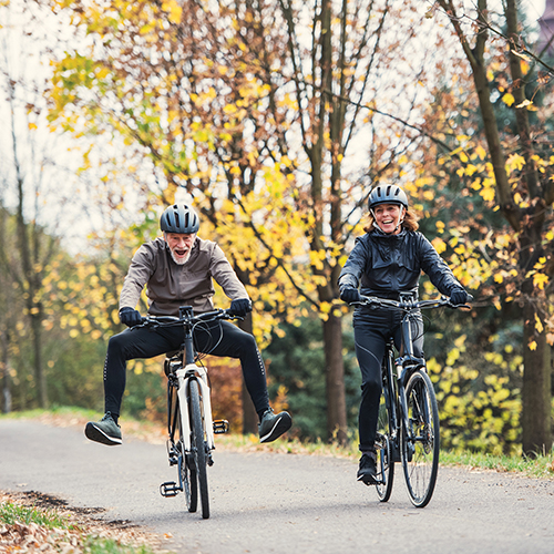  Adults riding electric bikes